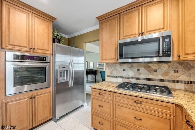 kitchen featuring light tile patterned flooring, appliances with stainless steel finishes, crown molding, and light stone countertops