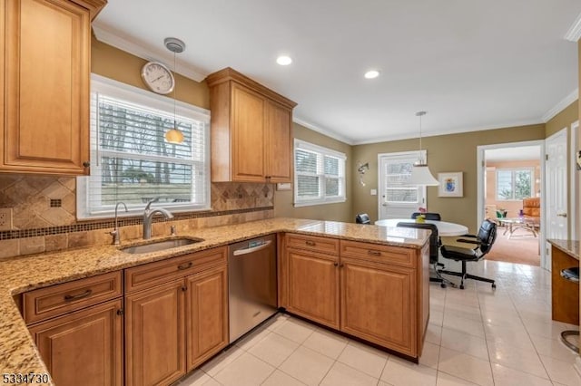 kitchen with decorative light fixtures, dishwasher, ornamental molding, a peninsula, and a sink