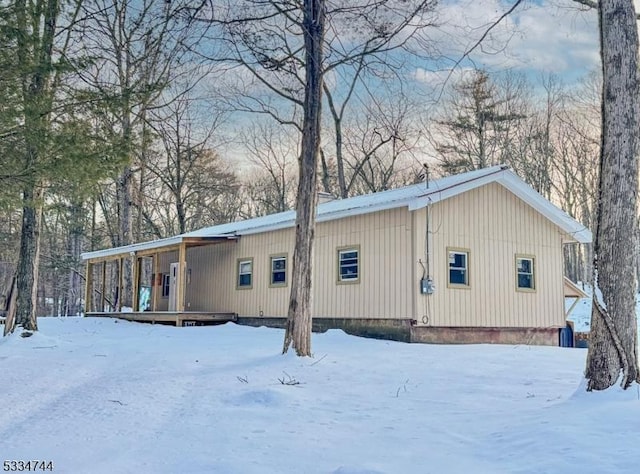 view of snow covered property