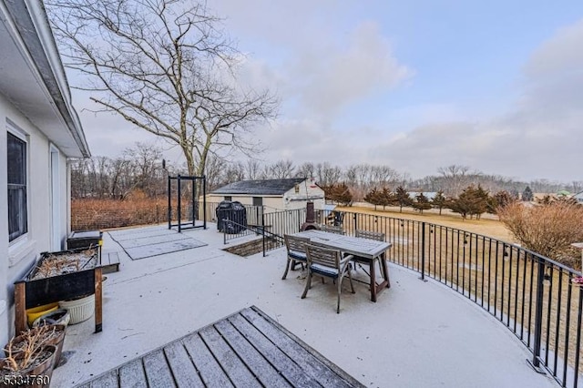 view of snow covered deck