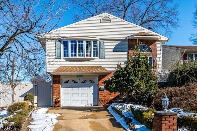 front facade with a garage