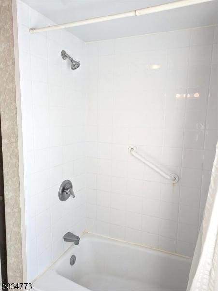 bathroom featuring shower / bath combination with curtain