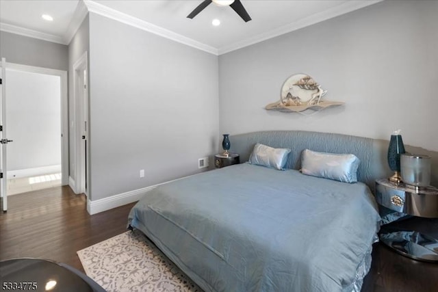 bedroom with dark wood-type flooring, ceiling fan, and ornamental molding