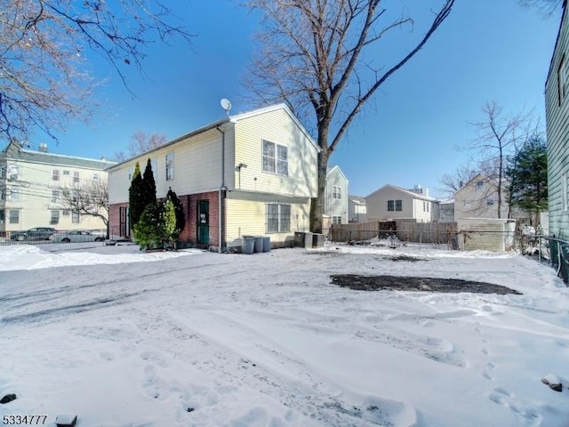 view of snow covered property