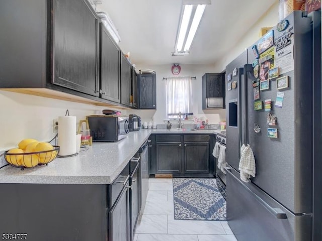 kitchen with high quality fridge and sink