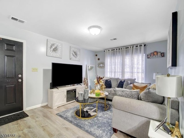 living room featuring light hardwood / wood-style floors