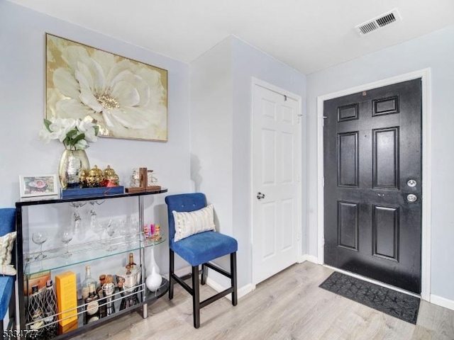 foyer featuring light wood-type flooring