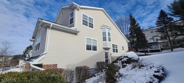 view of snow covered property