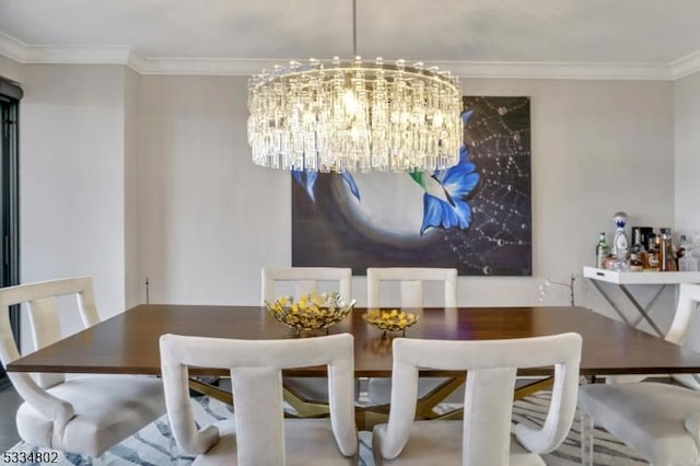 dining room featuring crown molding and a notable chandelier