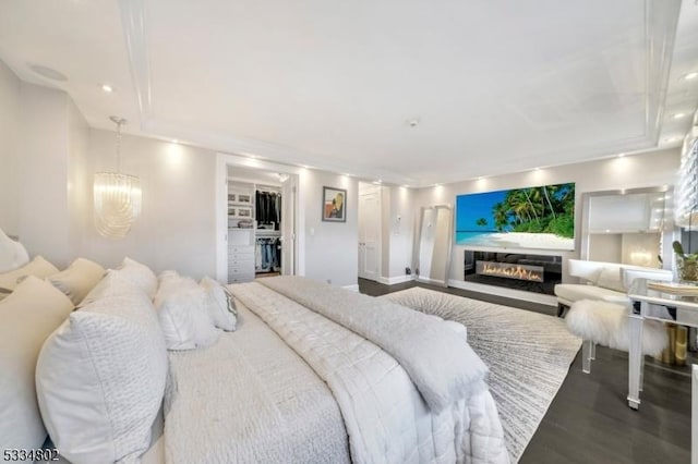 bedroom featuring hardwood / wood-style flooring and a closet