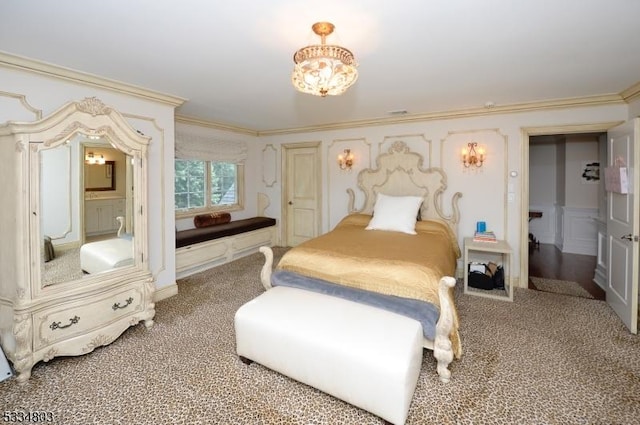 bedroom featuring ornamental molding and carpet flooring