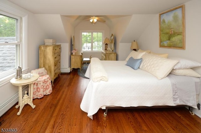 bedroom with ceiling fan, lofted ceiling, and dark hardwood / wood-style flooring