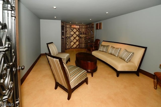 living area featuring light colored carpet