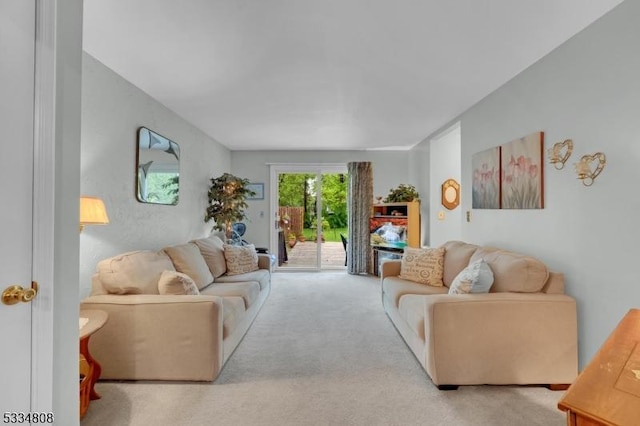 living room featuring light carpet