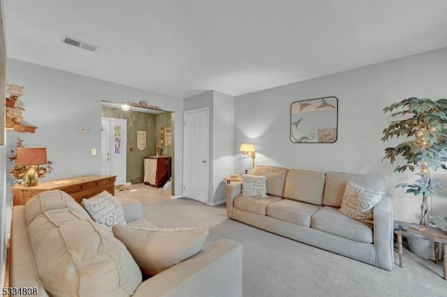 living area with carpet flooring and baseboards