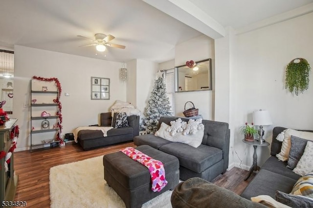 living room with dark hardwood / wood-style floors and ceiling fan