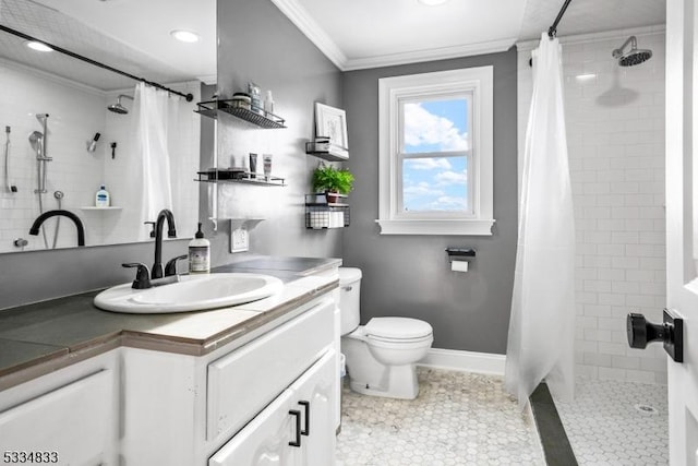 bathroom with vanity, crown molding, toilet, and a shower with shower curtain