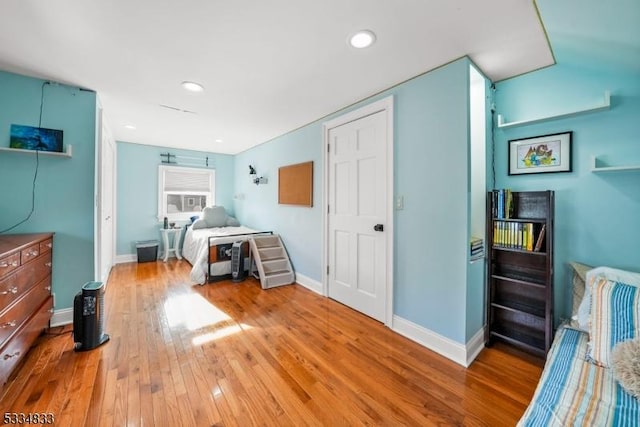 bedroom featuring hardwood / wood-style flooring