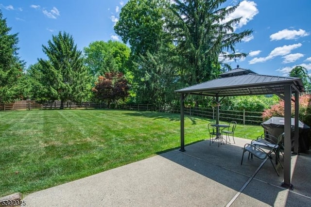 exterior space featuring a gazebo and a patio area