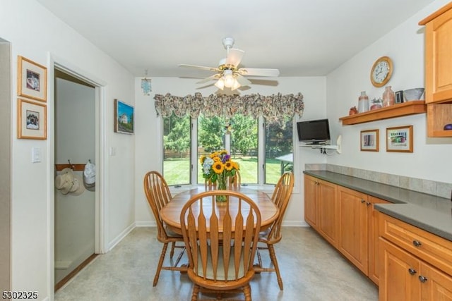 dining room with ceiling fan