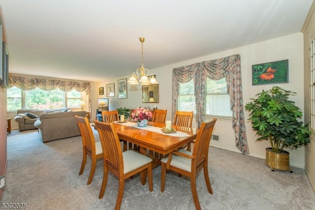 view of carpeted dining room