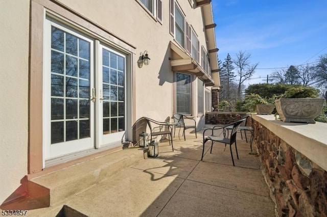 view of patio featuring french doors