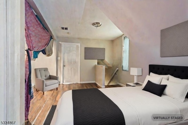 bedroom featuring hardwood / wood-style floors