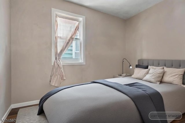 bedroom featuring hardwood / wood-style flooring