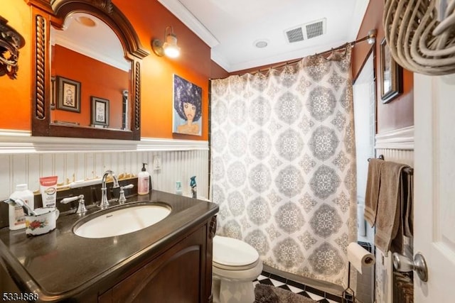 bathroom featuring vanity, ornamental molding, curtained shower, and toilet