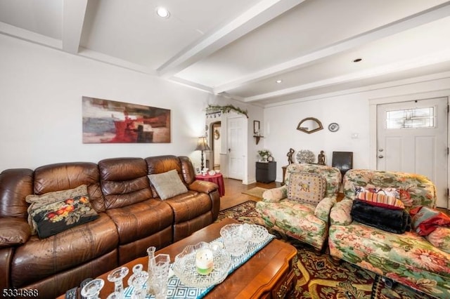 living room featuring beamed ceiling