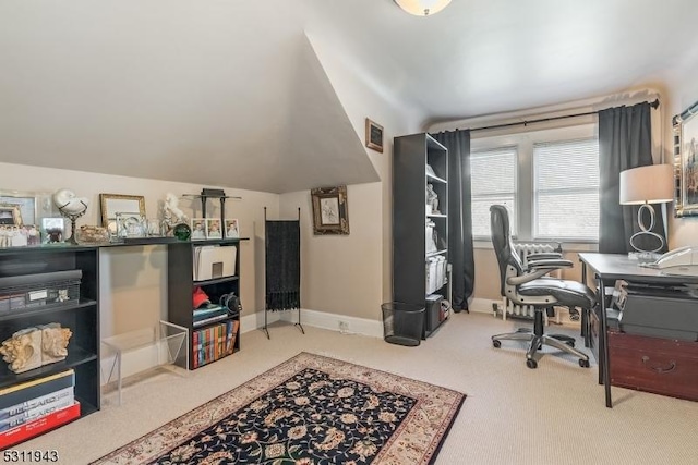 office space with lofted ceiling and carpet floors