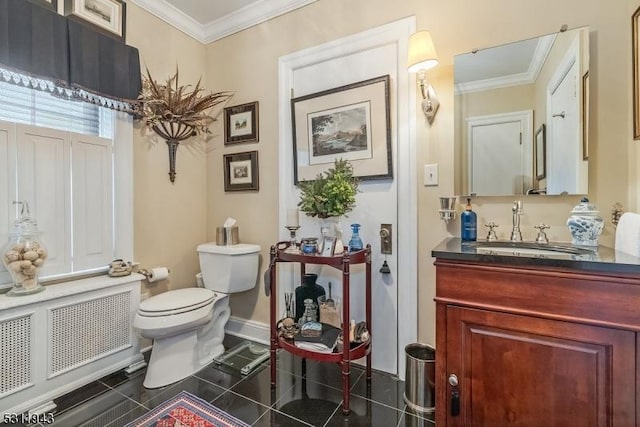 bathroom featuring toilet, ornamental molding, vanity, radiator, and tile patterned flooring