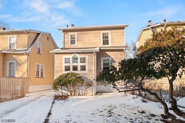 view of snow covered property