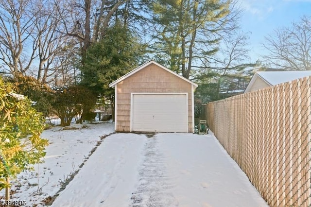 view of snow covered garage