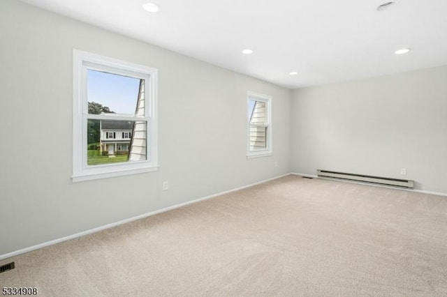 18 Yarmouth Ct, Scotch Plains Twp, NJ 07076 - empty room featuring a baseboard radiator, light colored carpet, baseboards, and recessed lighting