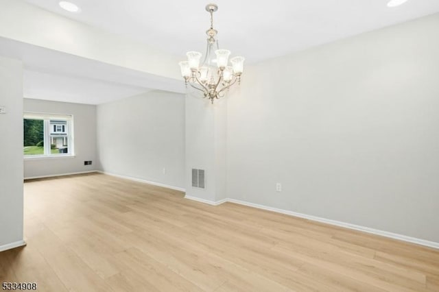 18 Yarmouth Ct, Scotch Plains Twp, NJ 07076 - spare room featuring a chandelier, light wood-style floors, baseboards, and recessed lighting