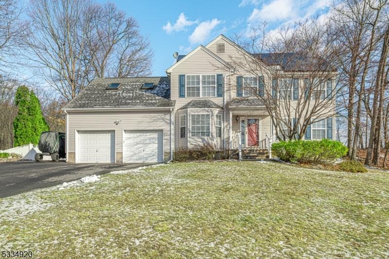 17 Anderson Rd, Wharton Boro, NJ 07885 - front of property with a garage and a front lawn