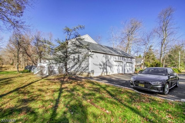 view of side of home featuring a yard