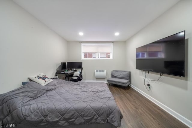 bedroom featuring hardwood / wood-style floors