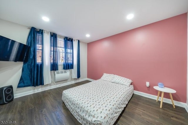 bedroom featuring dark wood-type flooring and radiator heating unit