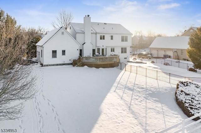 view of snow covered house