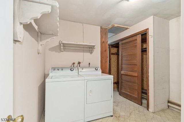 laundry room featuring laundry area, light floors, and independent washer and dryer