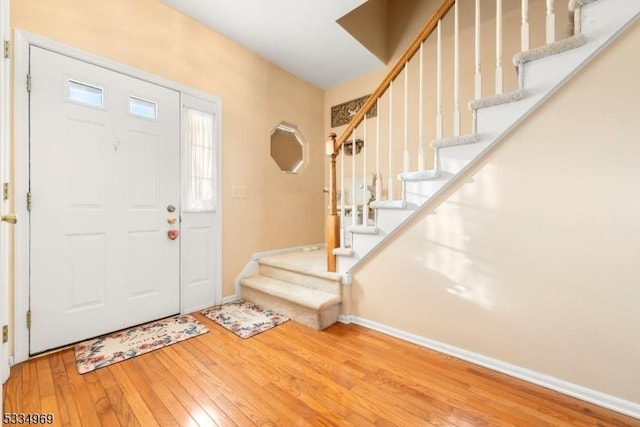 entrance foyer featuring hardwood / wood-style flooring