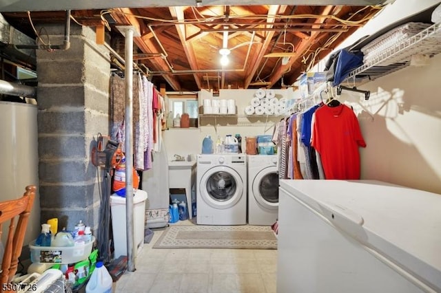 laundry area with washing machine and dryer