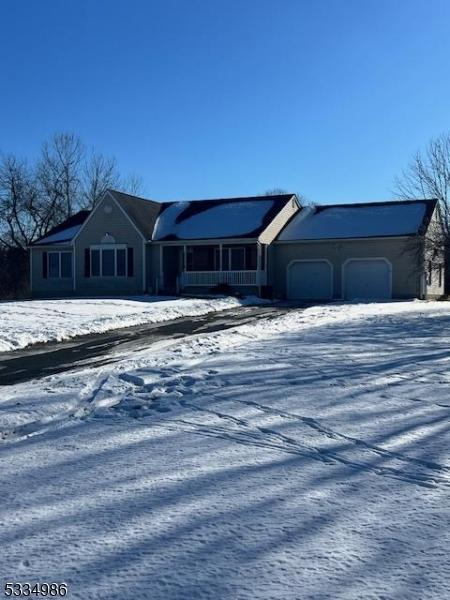 single story home featuring a garage