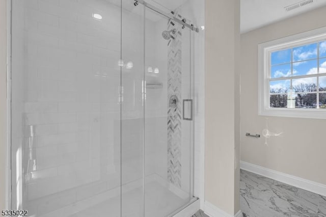 bathroom featuring an enclosed shower