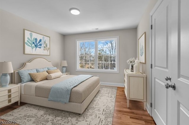 bedroom featuring light hardwood / wood-style floors