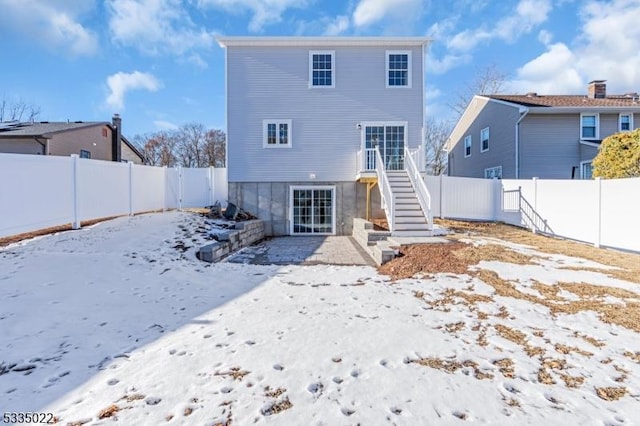 view of snow covered property