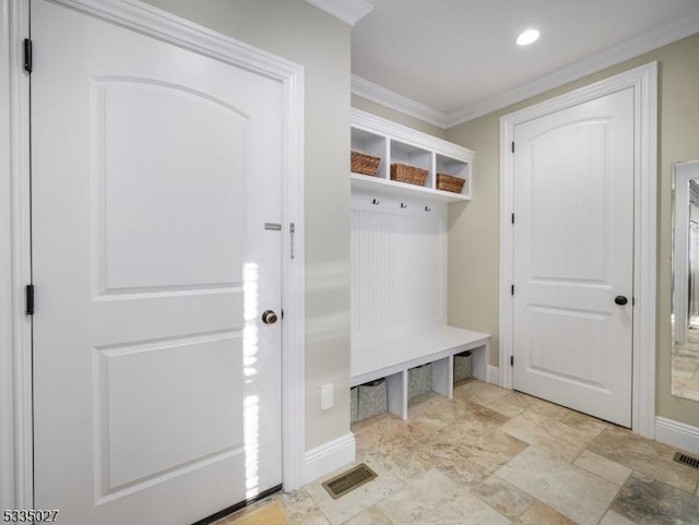 mudroom featuring ornamental molding