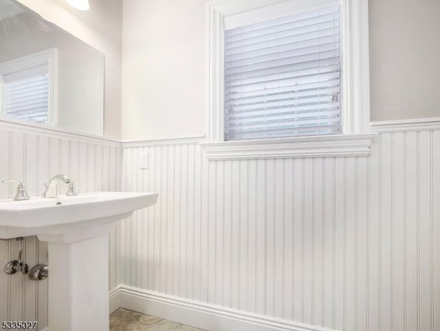 bathroom featuring sink and a wealth of natural light